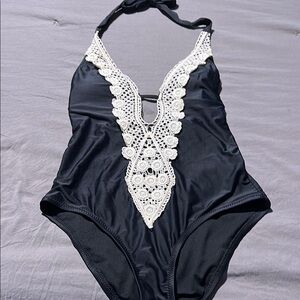 Black Swimsuit with White Crochet Detail